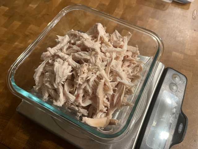 Shred the pre-cooked chicken
